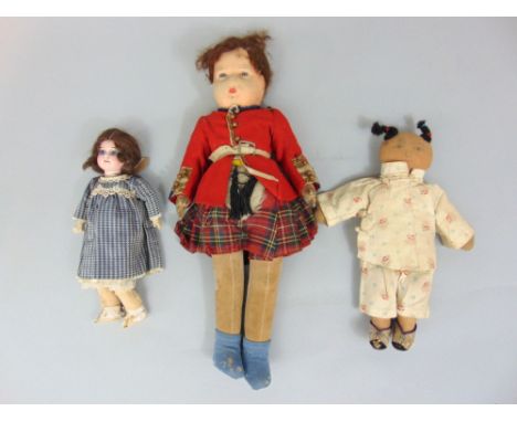 A small bisque headed doll by Armand Marseille, marked 1894, size 11 inches, with original dress and garments, socks and shoe