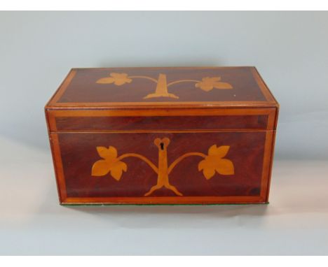 19th century boxwood inlaid flame mahogany tea caddy, 29cm wide; together with two relief moulded Japanese plaques, one with 