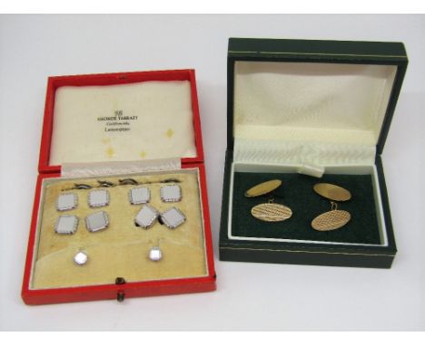 Cased 9ct white gold and mother of pearl dress set by George Tarratt comprising a pair of cufflinks, pair of studs and four b