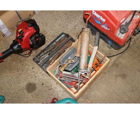 Two boxes containing various tools to include grease gun, paint roller, adjustable spanners, caulk gun etc.
