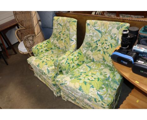 A pair of floral upholstered button back chairs  