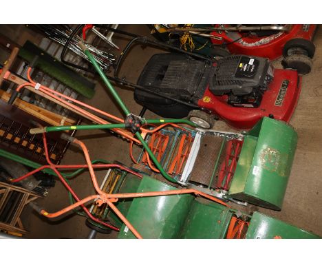 A Ransomes Ajax push cylinder mower with split rear roller and out front grass collection box