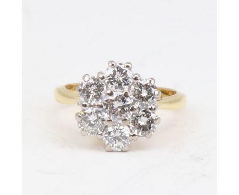 A late 20th century 18ct gold 7-stone diamond cluster flowerhead ring, set with modern round brilliant-cut diamonds, total di