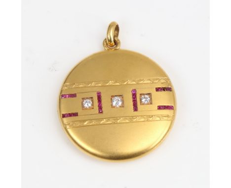 An early 20th century 14ct gold ruby and diamond photo locket pendant, set with old European-cut diamonds and calibre-cut rub