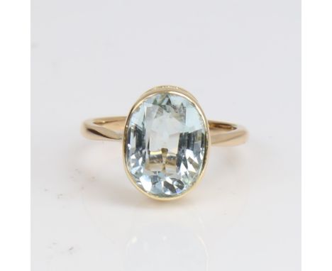 An 18ct gold aquamarine dress ring, set with oval mixed-cut aqua, setting height 11.8mm, size I, 2.8gNo damage or repair, aqu