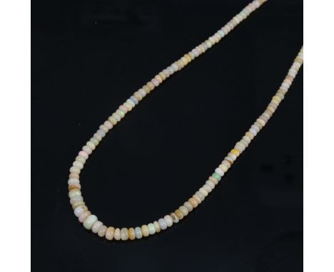 An Australian fire opal bead necklace, with sterling silver clasp, necklace length 47cm, 12.4gNo damage or repair, no missing