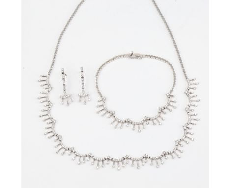 A Turkish 14ct white gold diamond drop demi-parure, comprising necklace, bracelet and pair of earrings, and diamond fringes, 