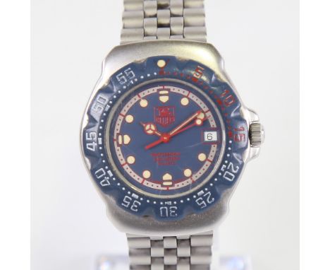 TAG HEUER - a stainless steel Formula 1 Professional 200M quartz wristwatch, ref. WA1210, blue dial with red accents, luminou