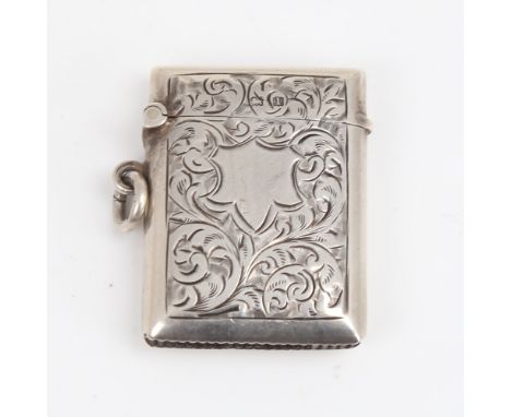 A George V silver Vesta case, allover foliate engraved decoration, by Constantine & Floyd, hallmarks Birmingham 1910, 4.5cm x