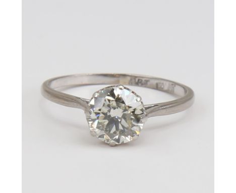 An 18ct white gold 1.56ct solitaire diamond ring set with round brilliant-cut diamond, with platinum tops, colour approx K, c