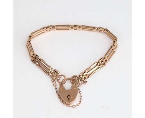 A Vintage 9ct gold gate link heart padlock bracelet, bracelet length 17cm, 13.3gNo damage or repairs, no broken links, settin