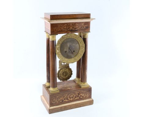 A 19th century rosewood and satinwood inlaid brass 4-pillar portico mantel clock, silvered dial with Roman numeral hour marke