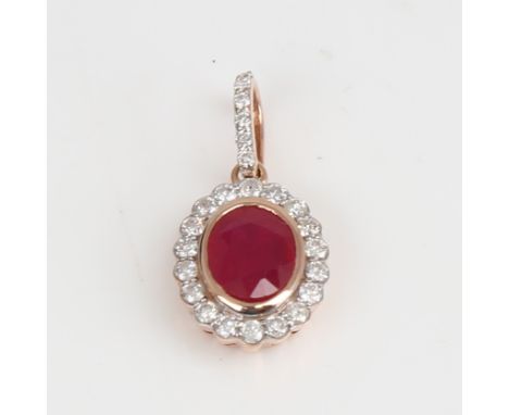 A modern 14ct rose gold ruby and diamond cluster pendant, set with oval mixed-cut ruby and round brilliant-cut diamonds, tota