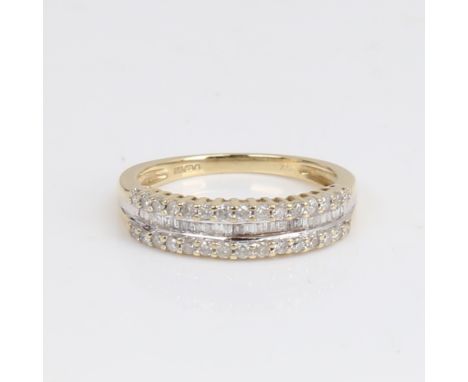 A modern 9ct gold diamond half hoop ring, set with modern round brilliant and baguette-cut diamonds, total diamond content ap