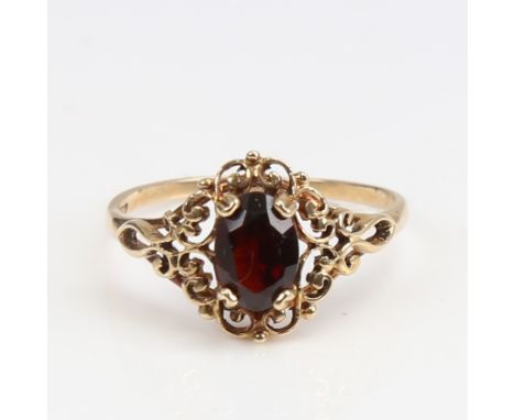 A late 20th century 9ct gold garnet dress ring, setting height 11.3mm, size N, 1.4gNo damage or repair, garnet has a few ligh