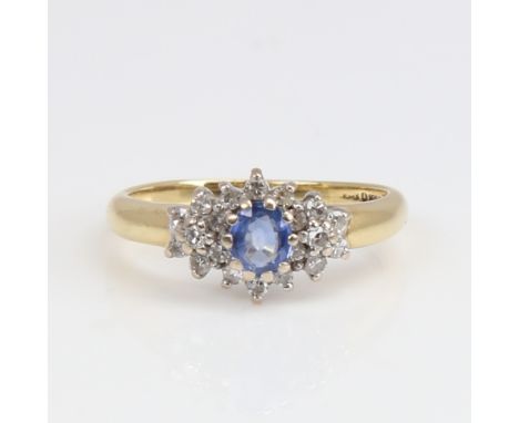 A late 20th century 18ct gold sapphire and diamond cluster ring set with oval mixed-cut sapphire and eight-cut diamonds, tota