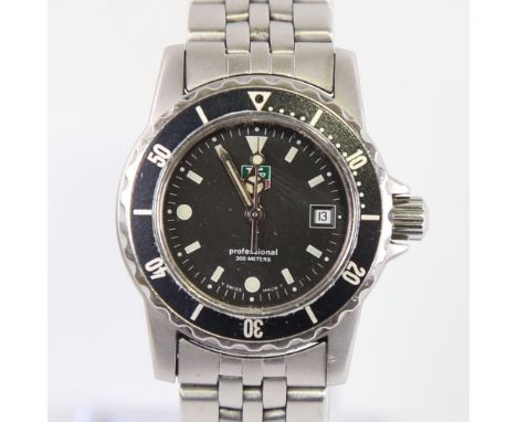 TAG HEUER - a lady's stainless steel 1500 Series Professional 200m quartz wristwatch, ref. WD1410-G-20, black dial with lumin