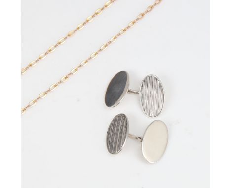 A 9ct gold chain necklace, 2.2g (A/F), and a pair of sterling silver engine turned cufflinks, 6.3g (2)Necklace is currently i