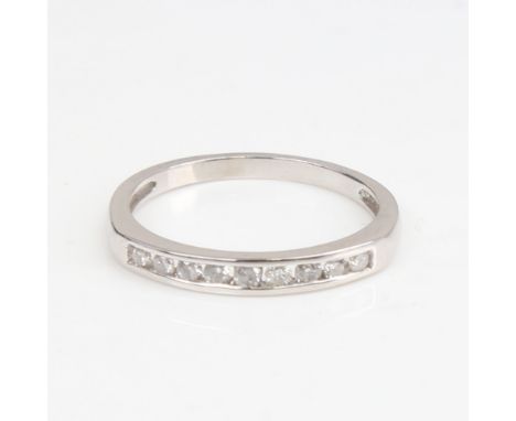 A modern unmarked white gold diamond half eternity ring, set with modern round brilliant-cut diamonds, total diamond content 