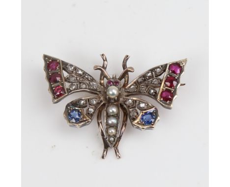 A Victorian unmarked gold ruby sapphire pearl and diamond figural butterfly brooch, set with round-cut rubies and sapphires w