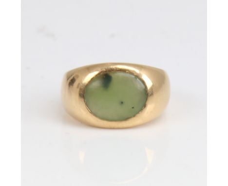 An 18ct gold jade signet ring, by Anaconda, jade dimensions approx 11mm x 8.65mm x 2.84mm, size M, 10.7gNo damage or repair, 