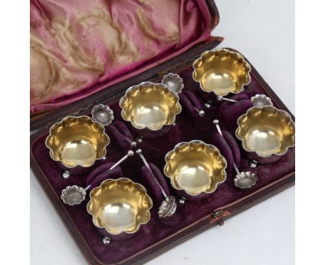 A Victorian set of 6 silver salt cellar cruets and spoons, by Horace Woodward & Co, hallmarks London 1885, diameter 4cm, 3.4o