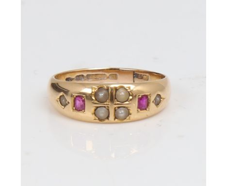 A late 19th century 15ct gold split-pearl and ruby dress ring, hallmarks Chester 1885, setting height 6.8mm, size Q, 4.2gAll 