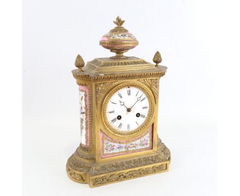 A French gilt-brass and Sevres Rose Pompador porcelain panel 8-day mantel clock, by Charles Frodsham, in Louis XVI style, whi