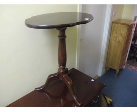 A VICTORIAN MAHOGANY OCCASIONAL TABLE the shaped moulded top above a baluster column on tripod support 70cm (h) x 60cm (w) x 