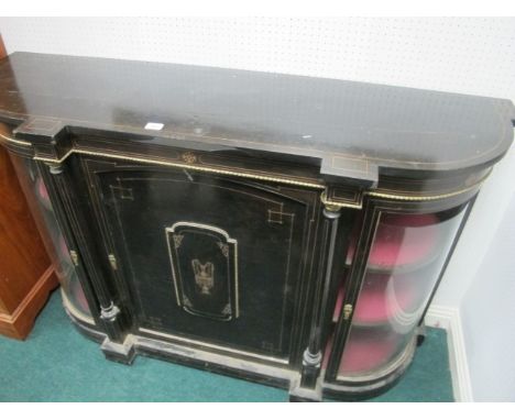 A VICTORIAN EBONISED CREDENZA of inverted breakfront outline the shaped moulded top above blind panel door between bowed glaz