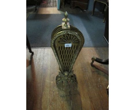 A BRASS FAN FIRESCREEN