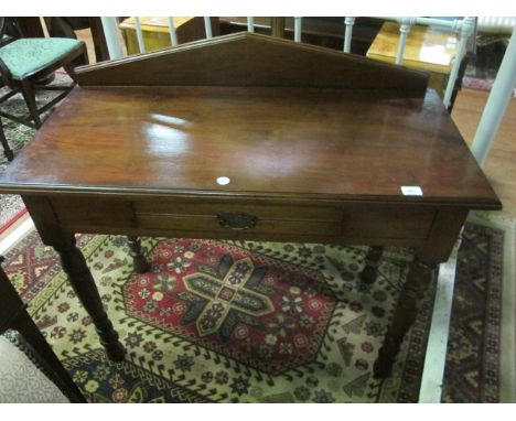 AN EDWARDIAN MAHOGANY SIDE TABLE the rectangular top with frieze drawer on turned legs 91cm (h) x 107cm (w) x 50cm (d)