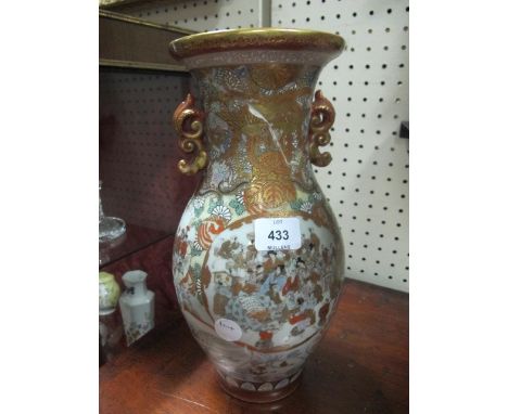 A PAIR OF CHINESE VASES each of baluster form the white and gilt ground decorated with figures amongst stylized foliage and f