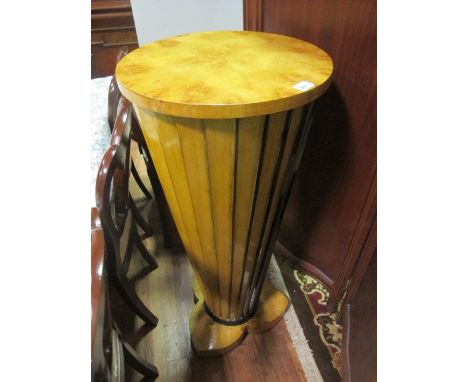 AN ART DECO STYLE BURR WALNUT PEDESTAL of circular outline the shaped moulded top raised on a tapering column with shaped pla