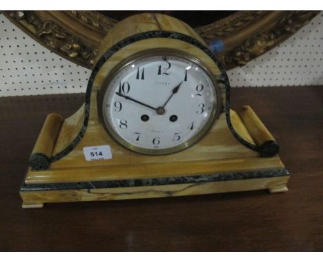 A SIENNA AND GREEN MARBLE MANTEL CLOCK the rectangular arched case with enamel dial raised on a rectangular base with block f