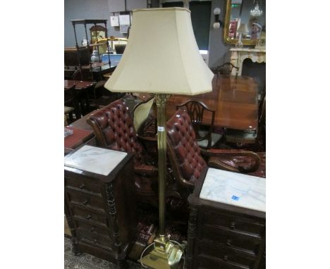 A BRASS FLOOR STANDARD LAMP the reeded column with Corinthian capital on square stepped base with shade 163cm high