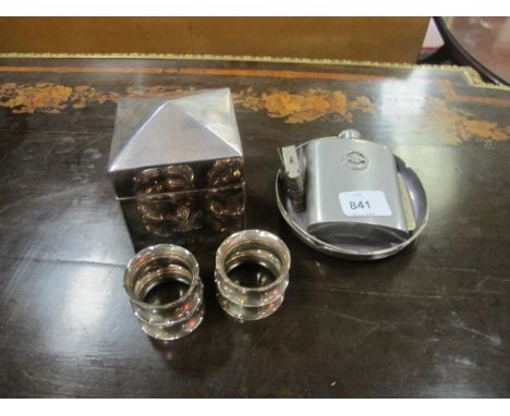 FOUR SILVER SERVIETTE RINGS together with a hip flask, tea caddy etc