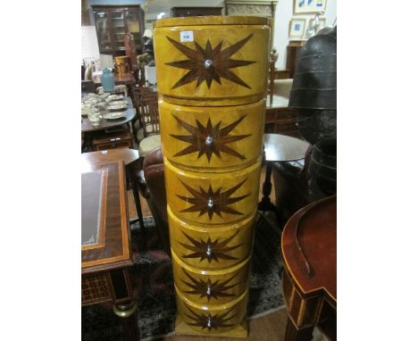 AN ART DECO STYLE WALNUT TALLBOY of rectangular bowed outline the shaped moulded top above six long drawers on shaped platfor