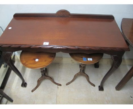 A MAHOGANY CHIPPENDALE STYLE SIDE TABLE the rectangular top with gadrooned rim on cabriole legs with pad feet