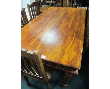 A MEXICAN HARDWOOD SEVEN PIECE DINING ROOM SUITE comprising a rectangular top table together with six chairs each with a vert