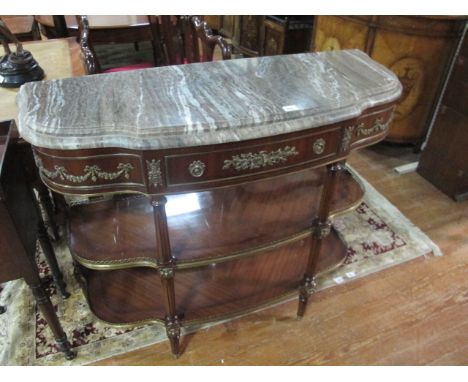 A GOOD CONTINENTAL KINGWOOD AND GILT BRASS MOUNTED SIDE TABLE surmounted with a vein marble top above a frieze drawer with gi