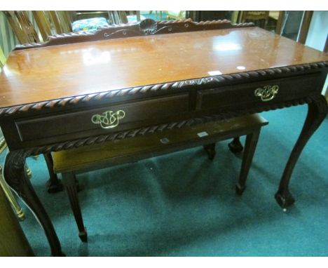 A CHIPPENDALE STYLE MAHOGANY SIDE TABLE the rectangular top with gadrooned rim above two frieze drawers on cabriole legs with