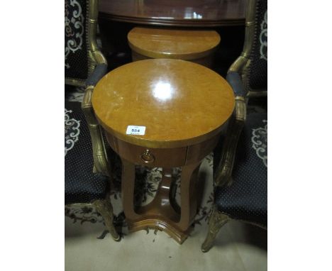 A PAIR OF ART DECO STYLE BURR WALNUT LAMP TABLES each of circular form with frieze drawer on shaped supports and concave plat