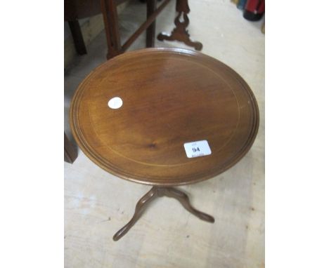 A PAIR OF MAHOGANY WINE TABLES each with a circular dish top above a baluster column on tripod support
