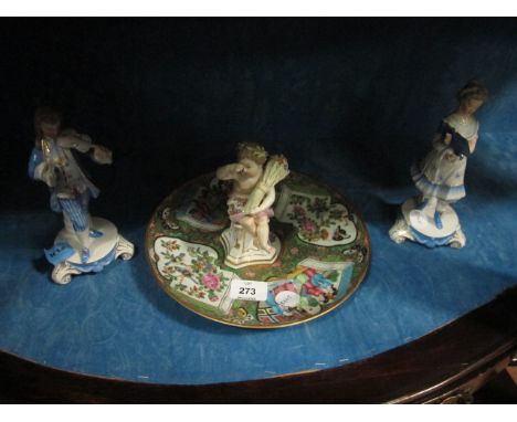 A COLLECTION OF CHINA to include a Cantonese plaque in German porcelain figure modelled as a putti shown seated together with