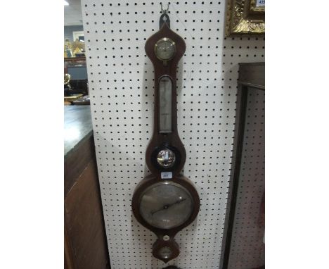 A GEORGIAN MAHOGANY BANJO BAROMETER with silvered dials inscribed "P Fringle Cork" 82cm high