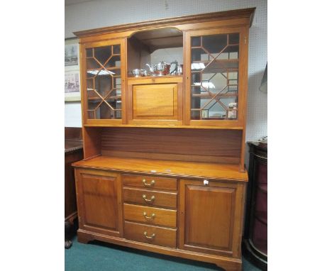 A MAHOGANY WALL CABINET the dentil moulded cornice above an open shelf with hinged compartment flanked on each side by astrag
