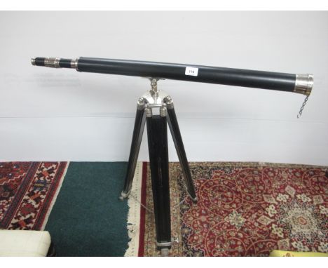 A STAINED BEECHWOOD AND CHROME TELESCOPE on adjustable tripod support