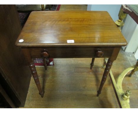 AN EDWARDIAN WALNUT SIDE TABLE the rectangular top above a frieze drawer on turned legs 74cm (h) x 66cm (w) x 46cm (d)