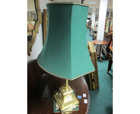 A BRASS CORINTHIAN COLUMN TABLE LAMP raised on a square stepped base with shade 72cm high